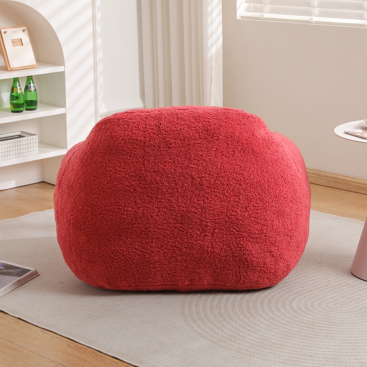 Red sherpa ottoman with textured fabric