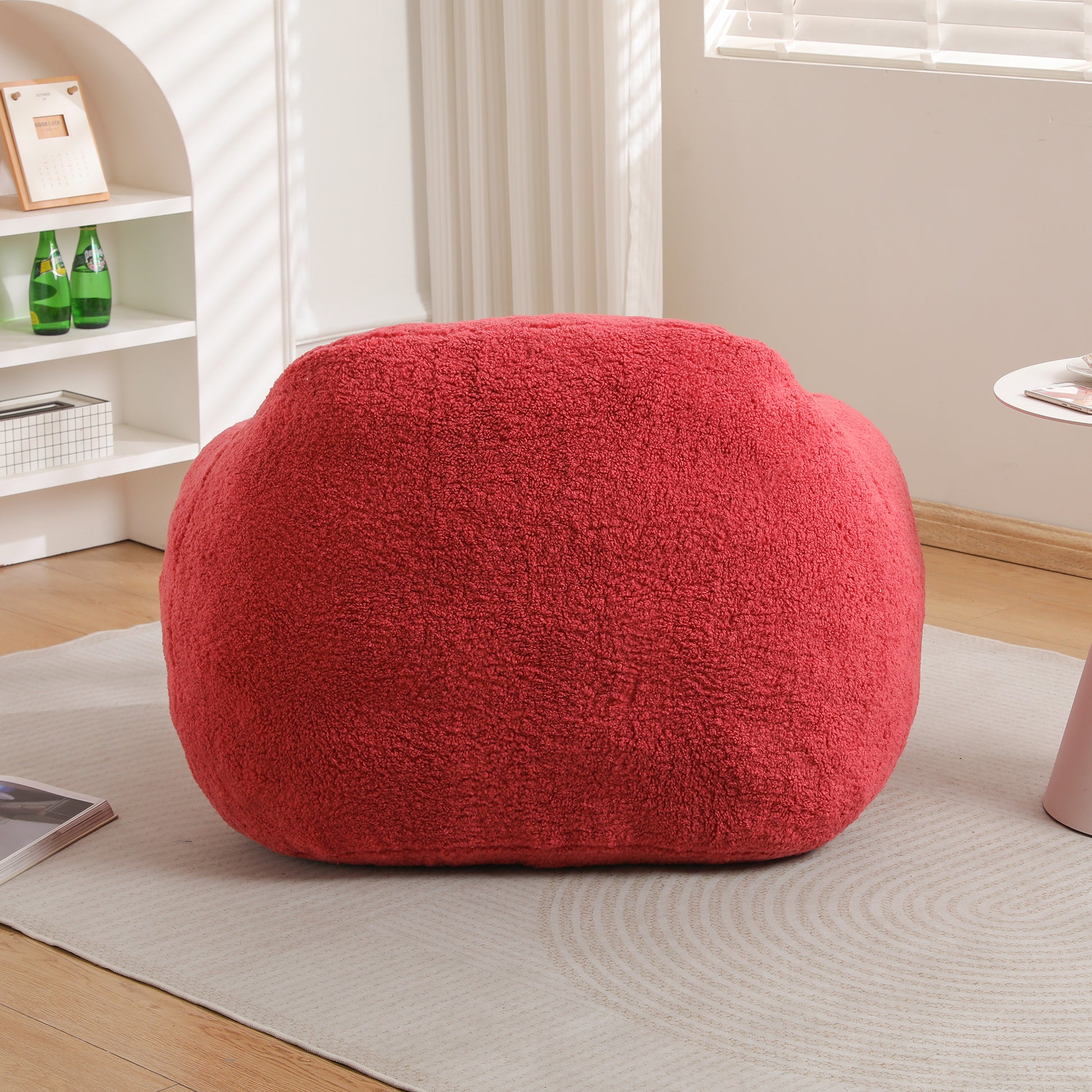 Red sherpa ottoman with textured fabric