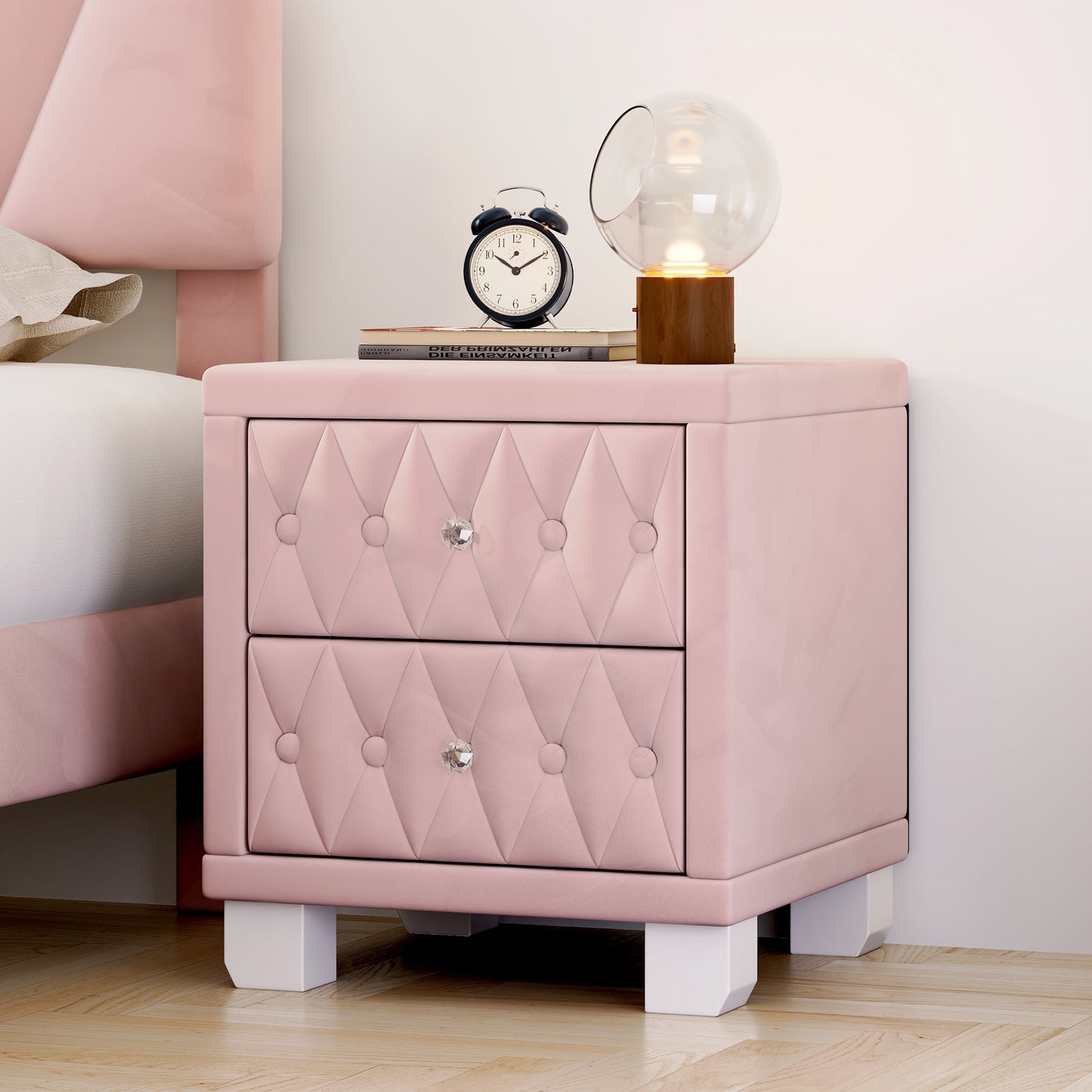 Pink velvet tufted nightstand with crystal knobs