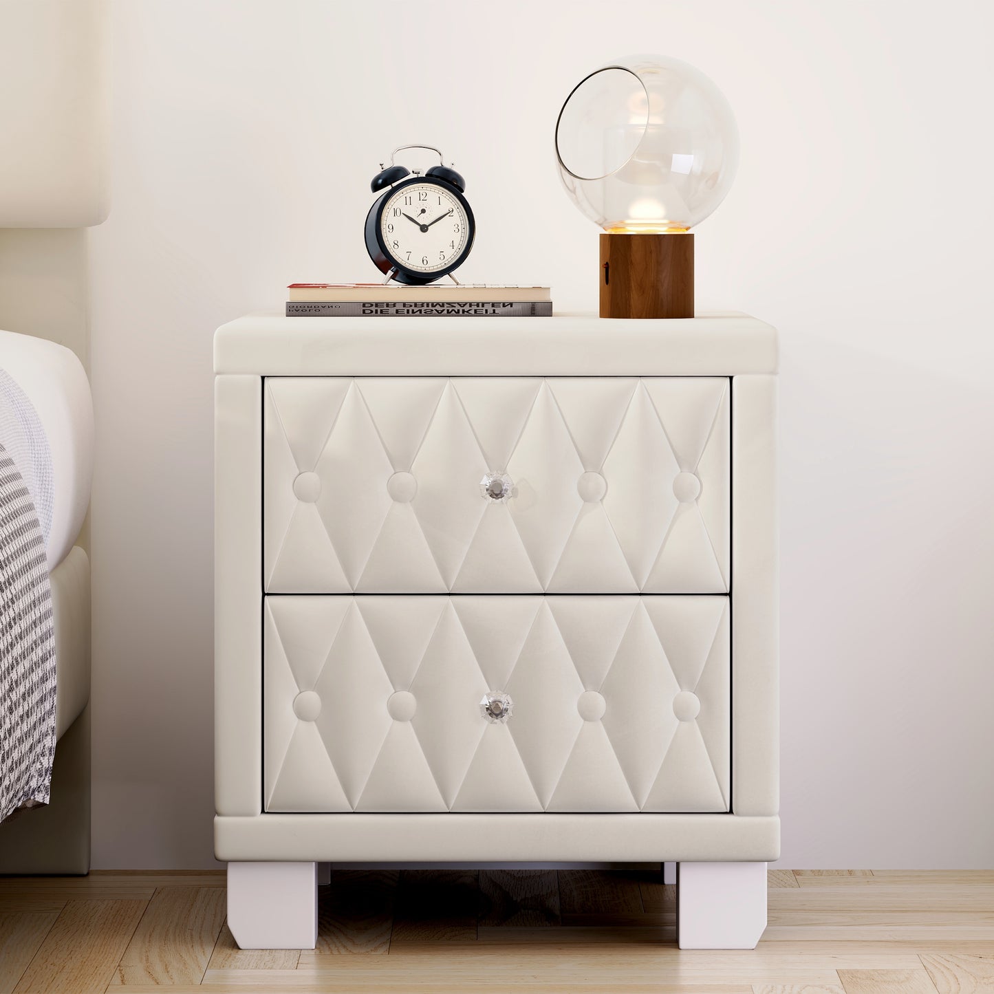 Cream tufted nightstand with diamond pattern and crystal knobs