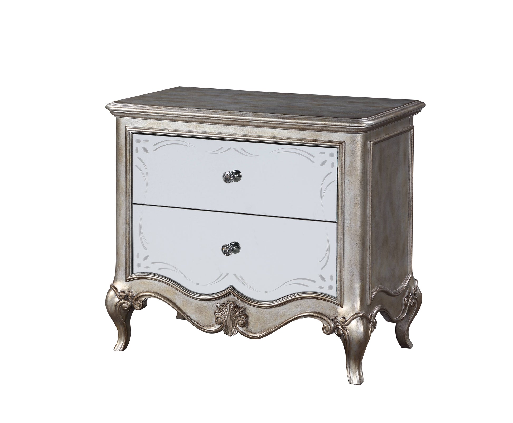 Antique silver nightstand with mirrored drawers and ornate carvings