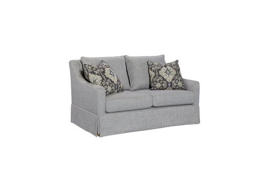 Gray textured loveseat with decorative throw pillows
