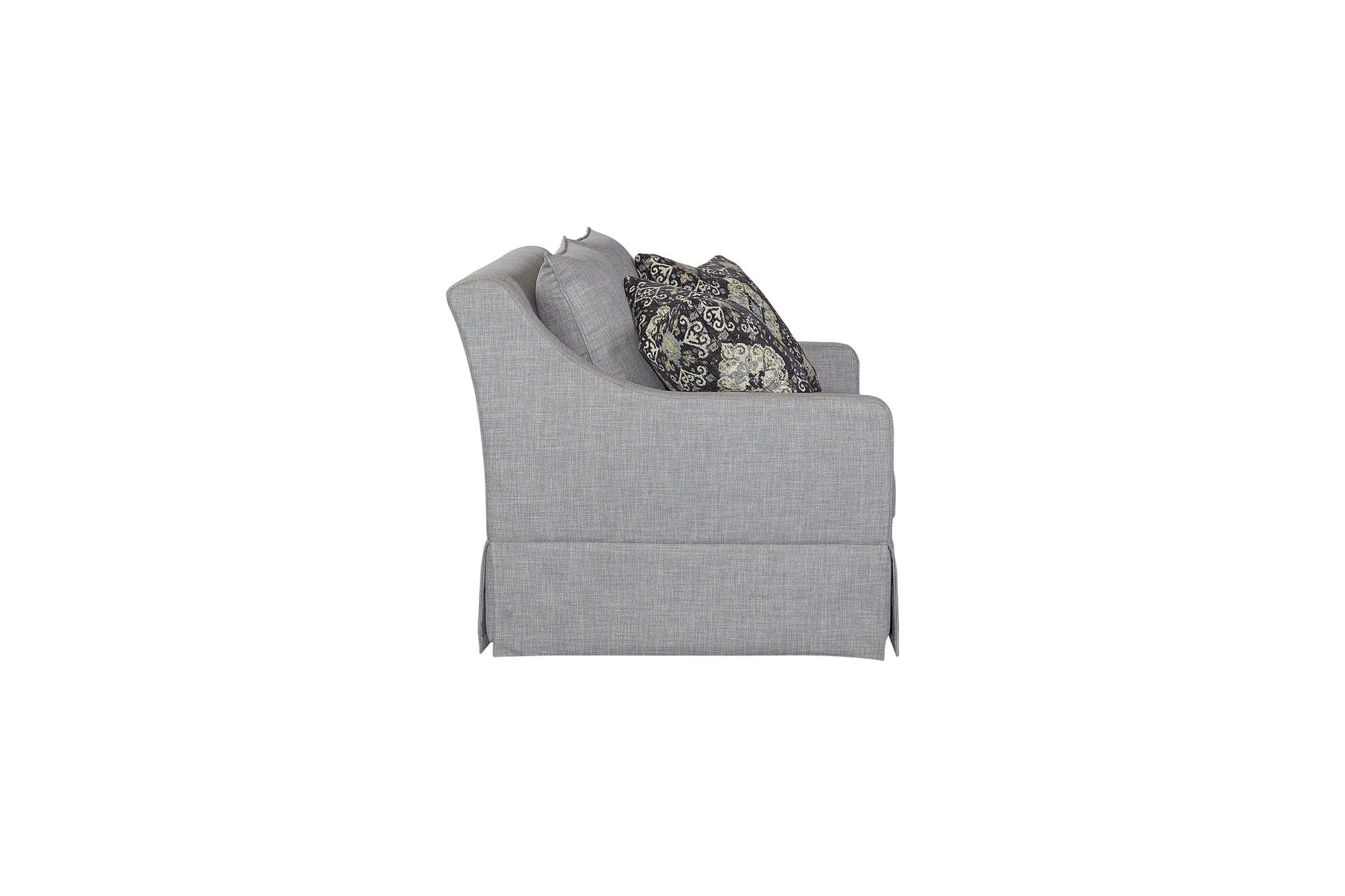 Grey upholstered sofa with patterned throw pillow