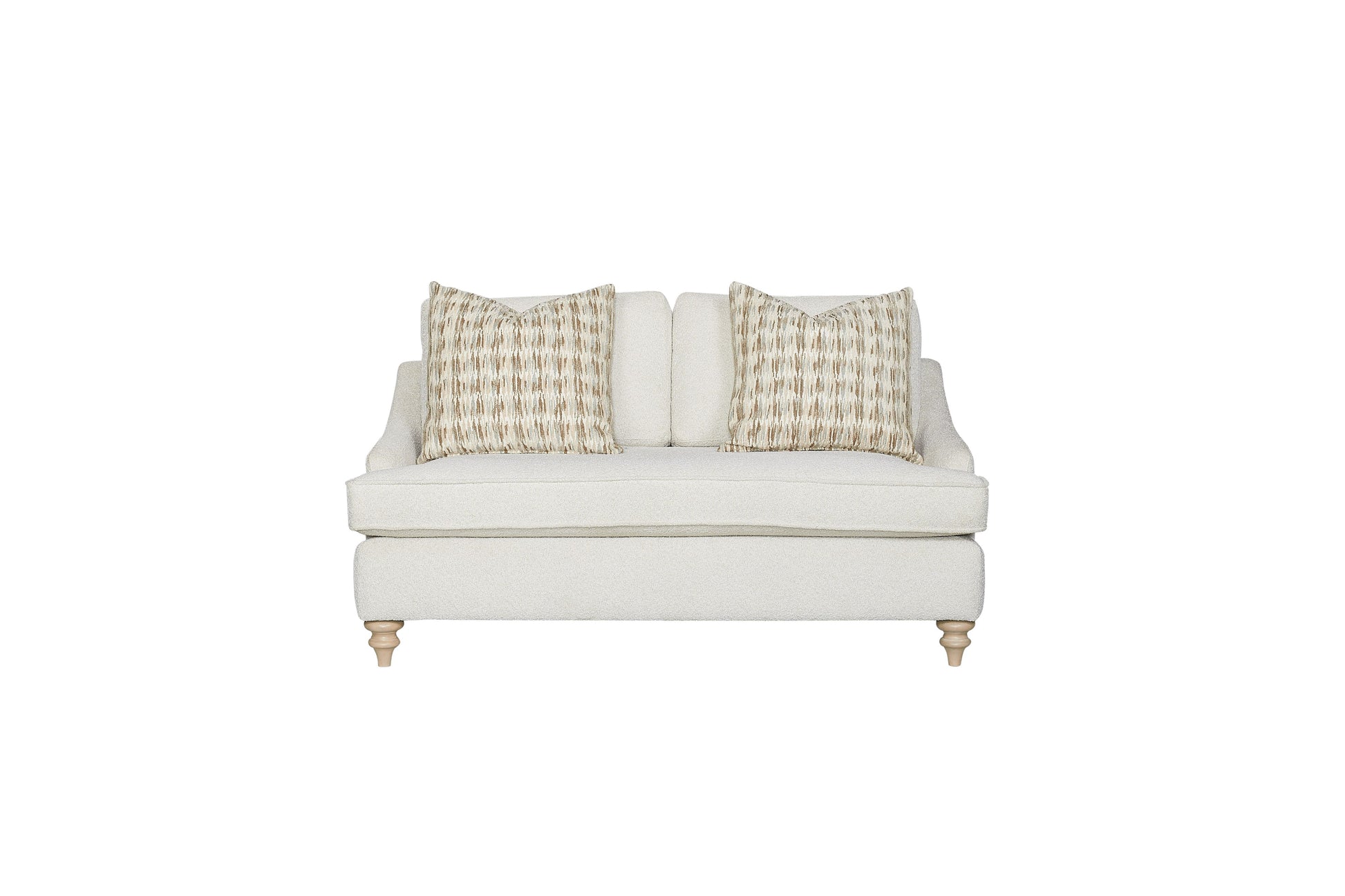 Cream boucle loveseat with geometric patterned accent pillows and turned wooden legs modern farmhouse style