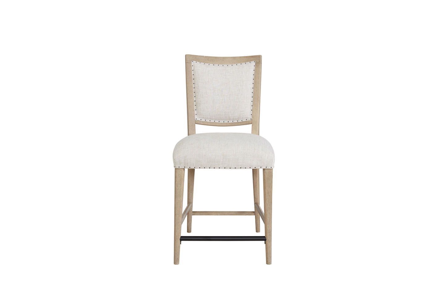 Neutral upholstered counter stool with natural wood frame and nailhead trim
