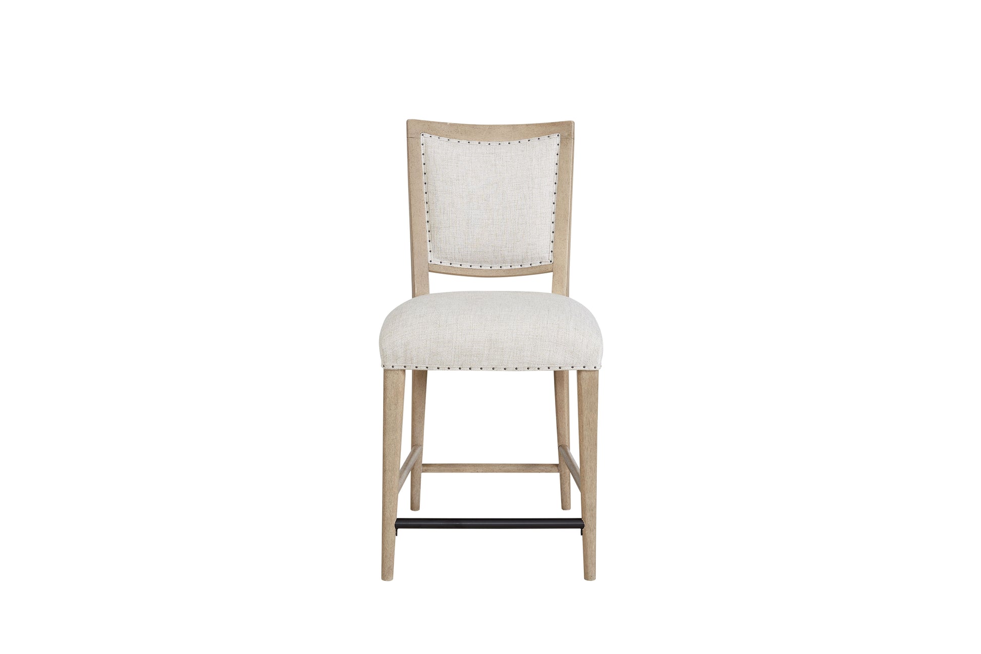 Neutral upholstered counter stool with natural wood frame and nailhead trim