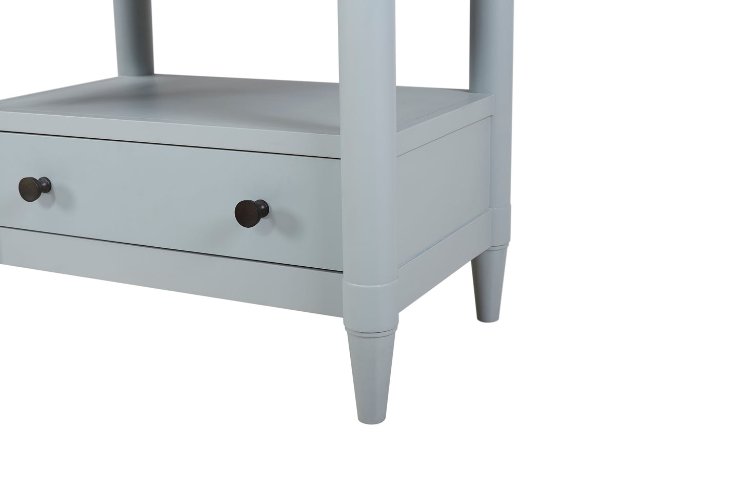 Light gray bedside table with two drawers and black knobs