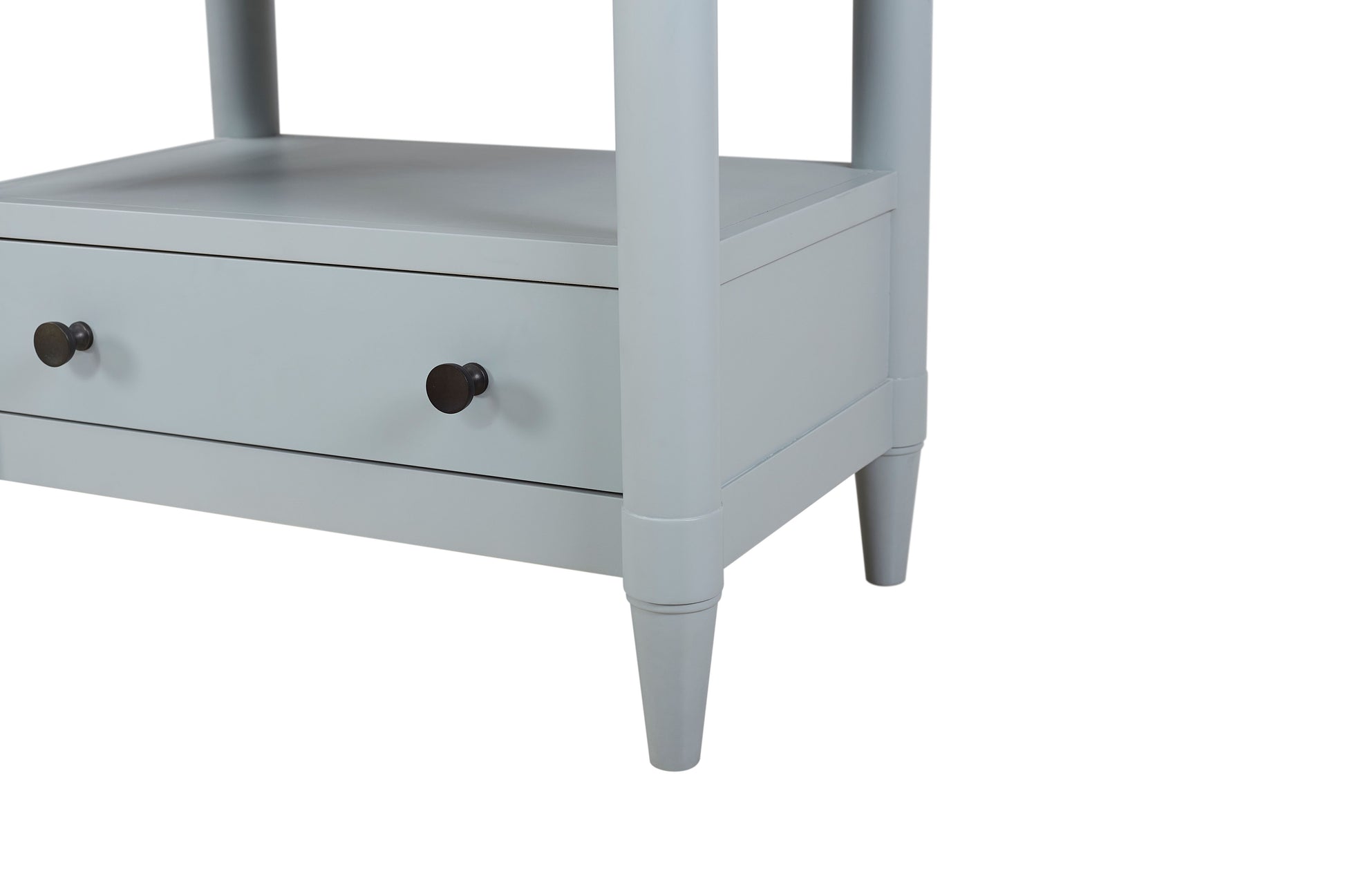 Light gray bedside table with two drawers and black knobs