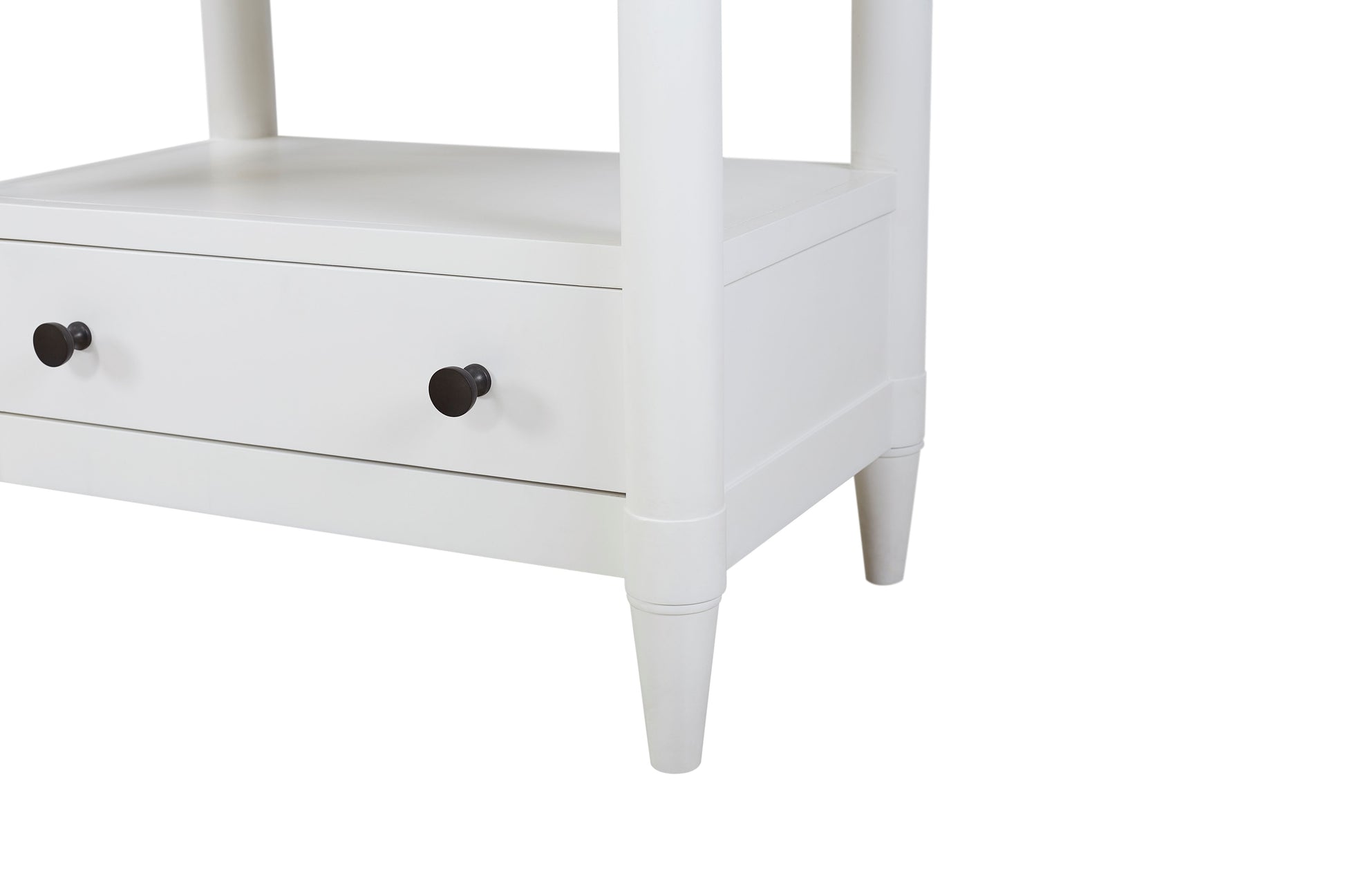 White twodrawer side table with black round knobs