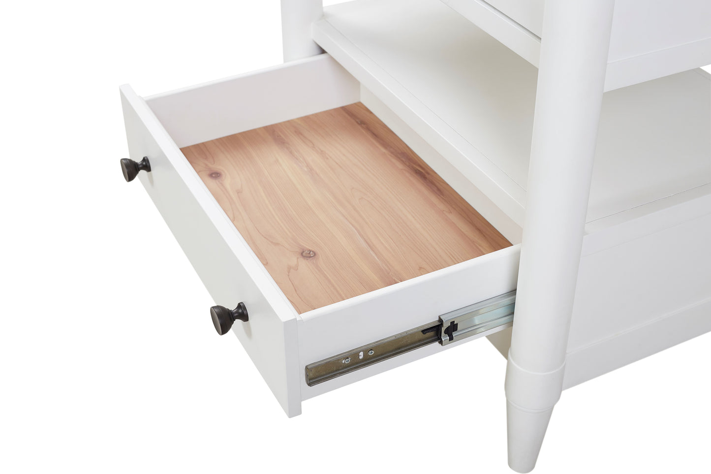 White painted wood drawer with dark knob and visible drawer slide mechanism