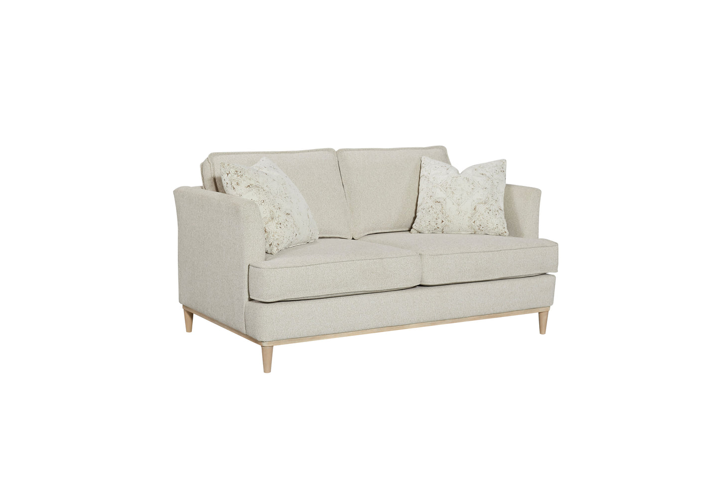 Beige fabric twoseater sofa with patterned throw pillows and wooden legs