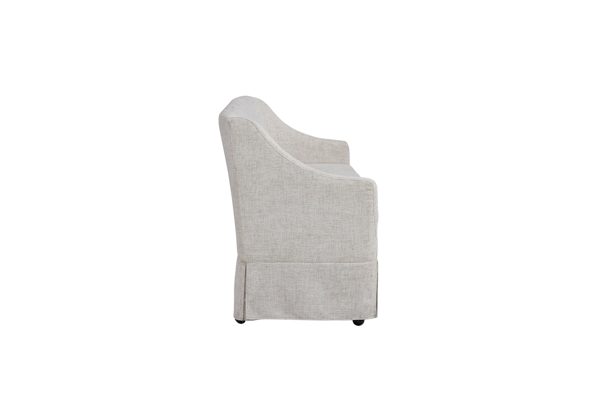 Beige upholstered armchair with skirted base and casters