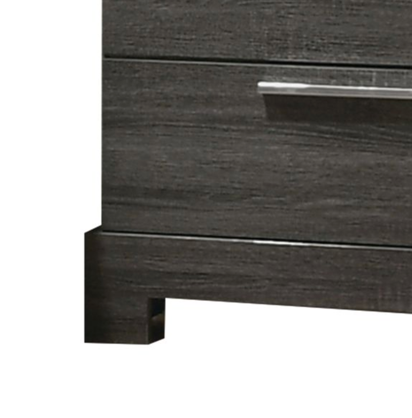 Dark grey wood dresser drawer closeup with brushed nickel pull