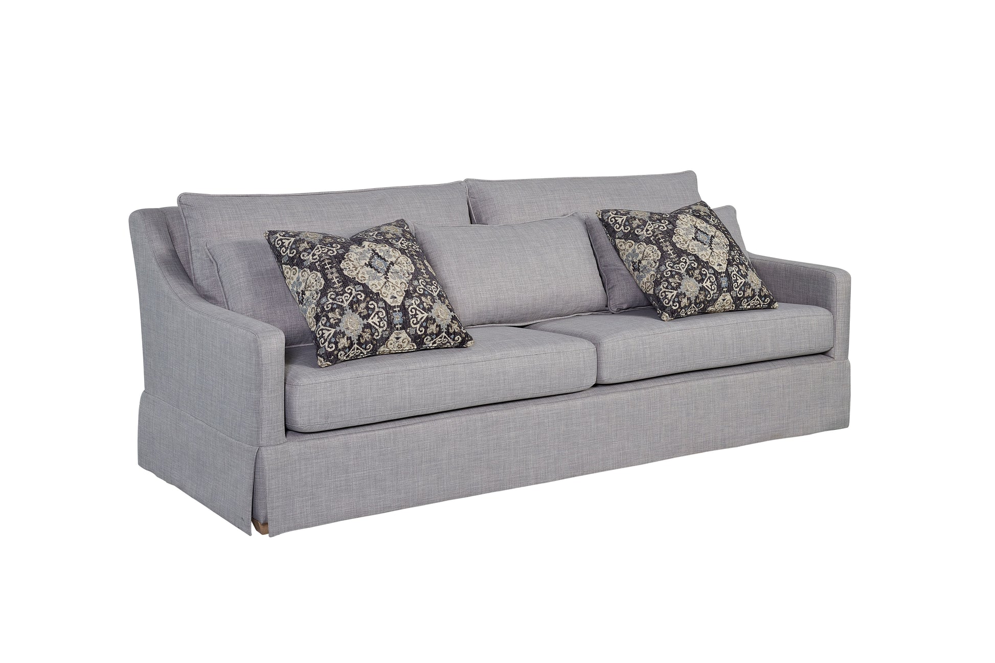 Textured gray fabric sofa with ornate patterned accent pillows for living room decor