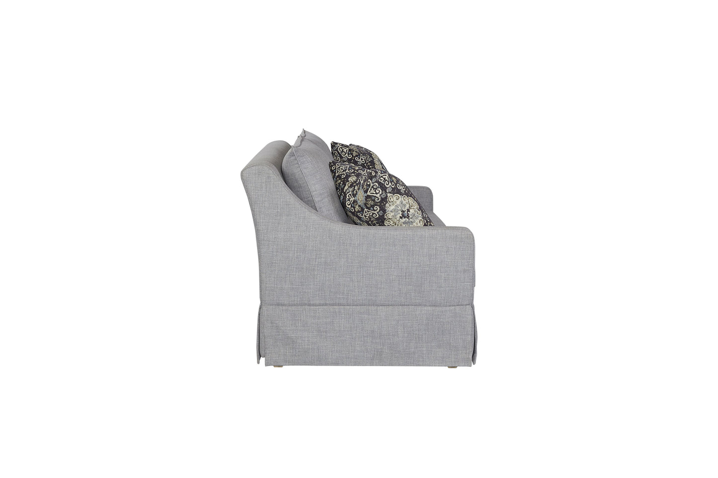 Gray linen slipcovered sofa with ornate accent pillow