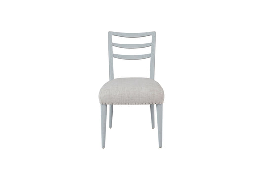 Light gray wooden dining chair with upholstered seat