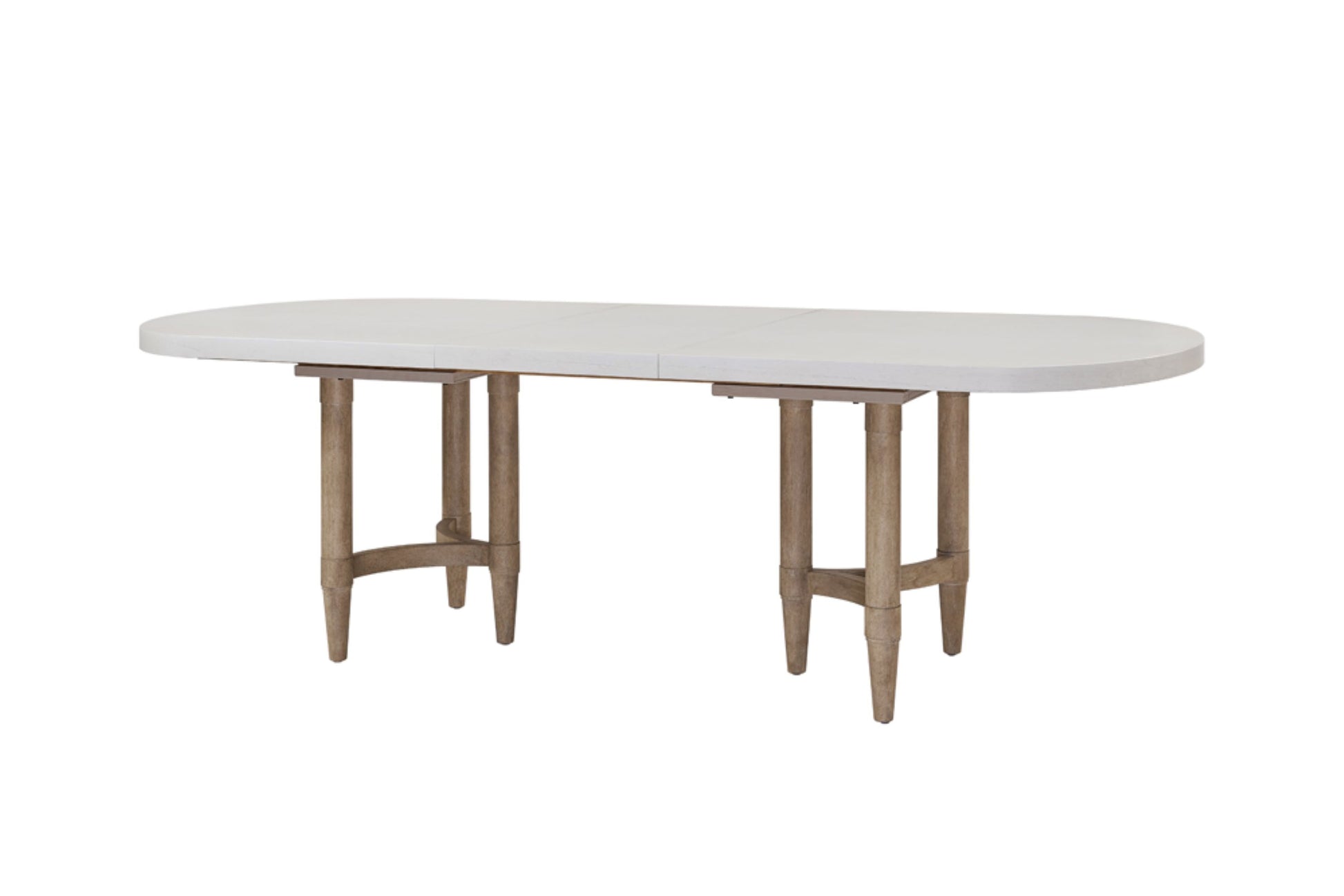 White oval dining table with light wood legs