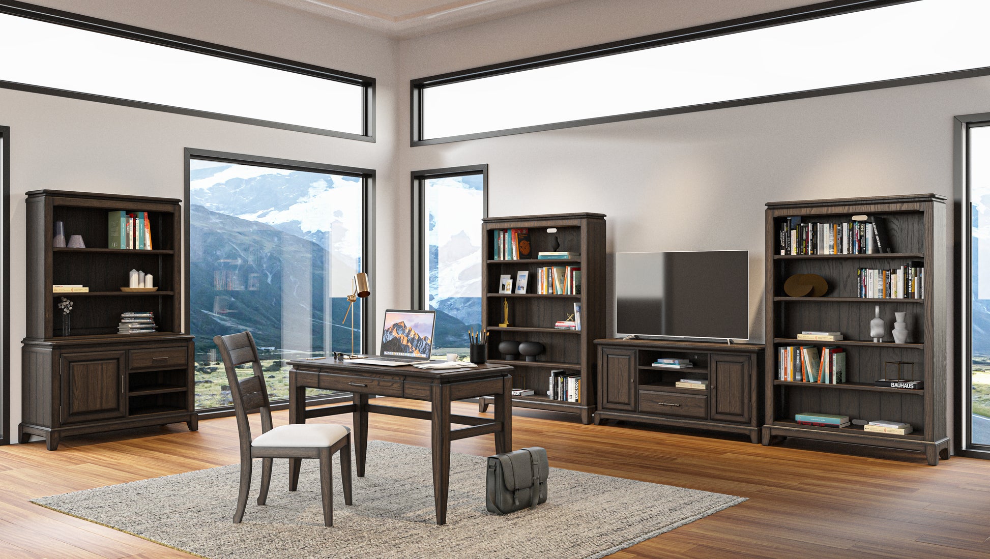 Dark wood office desk with laptop and lamp