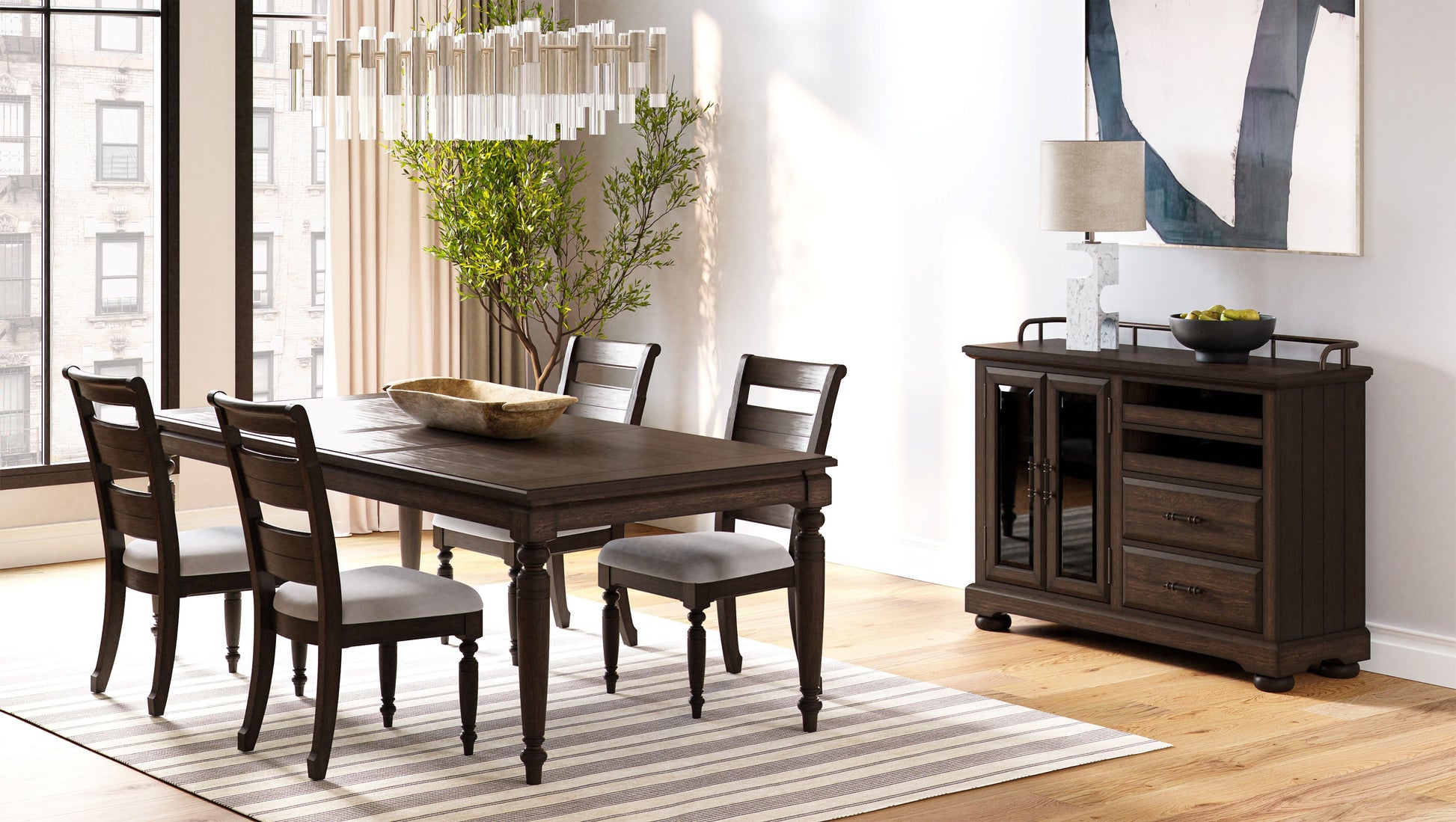 Dark wood dining table with four upholstered chairs and striped rug