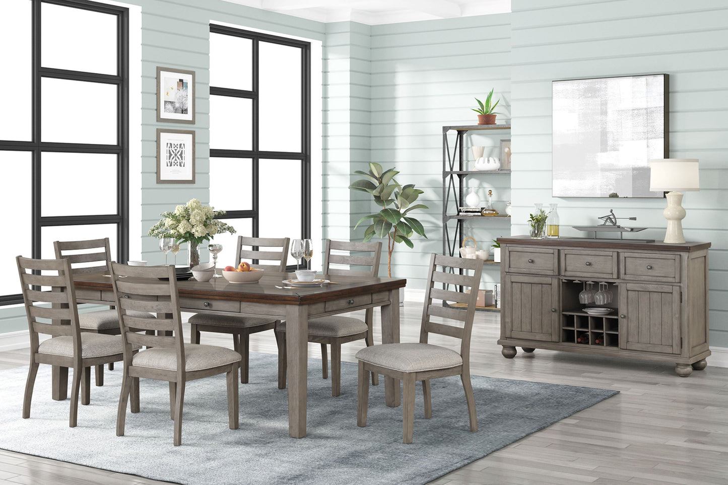 Rustic grey wood dining table with upholstered chairs and matching sideboard