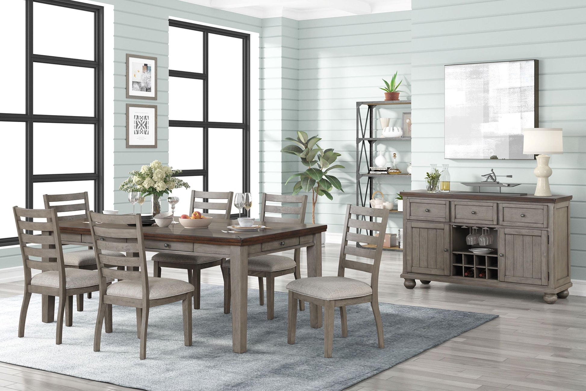 Rustic grey wood dining table with upholstered chairs and matching sideboard
