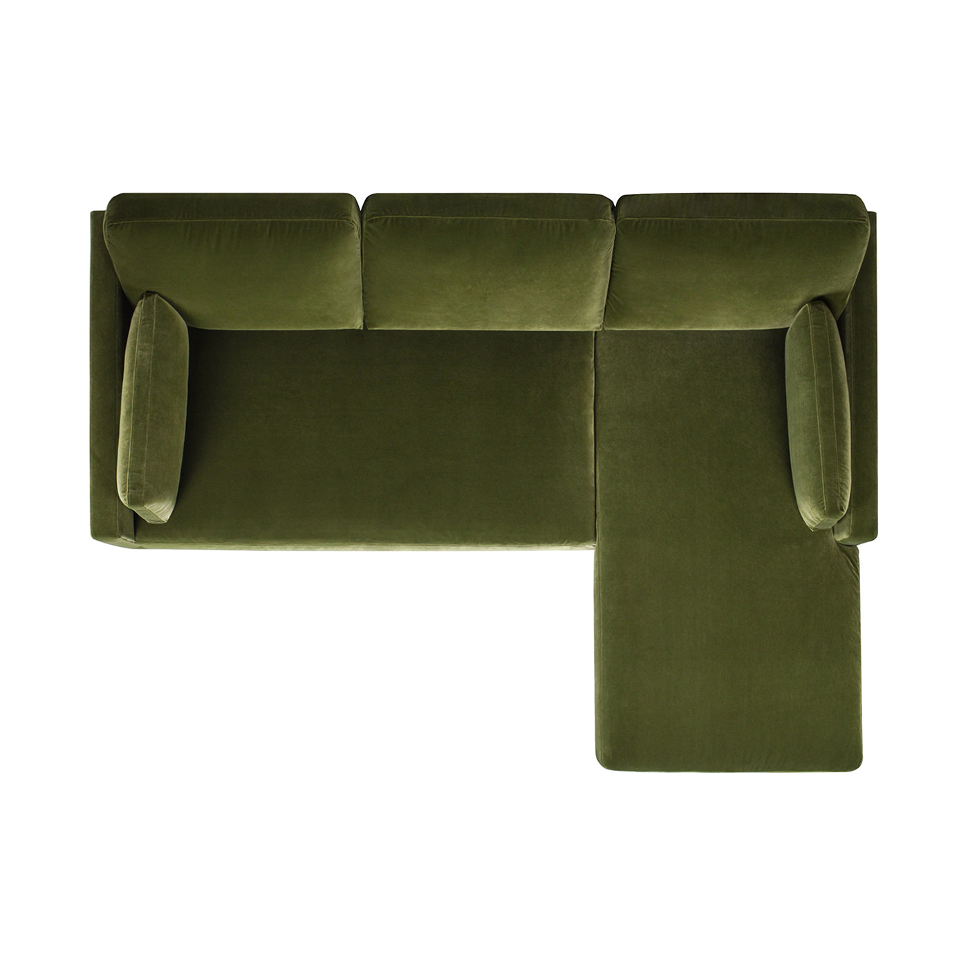Overhead view of a luxurious moss green velvet sectional sofa with deep cushions