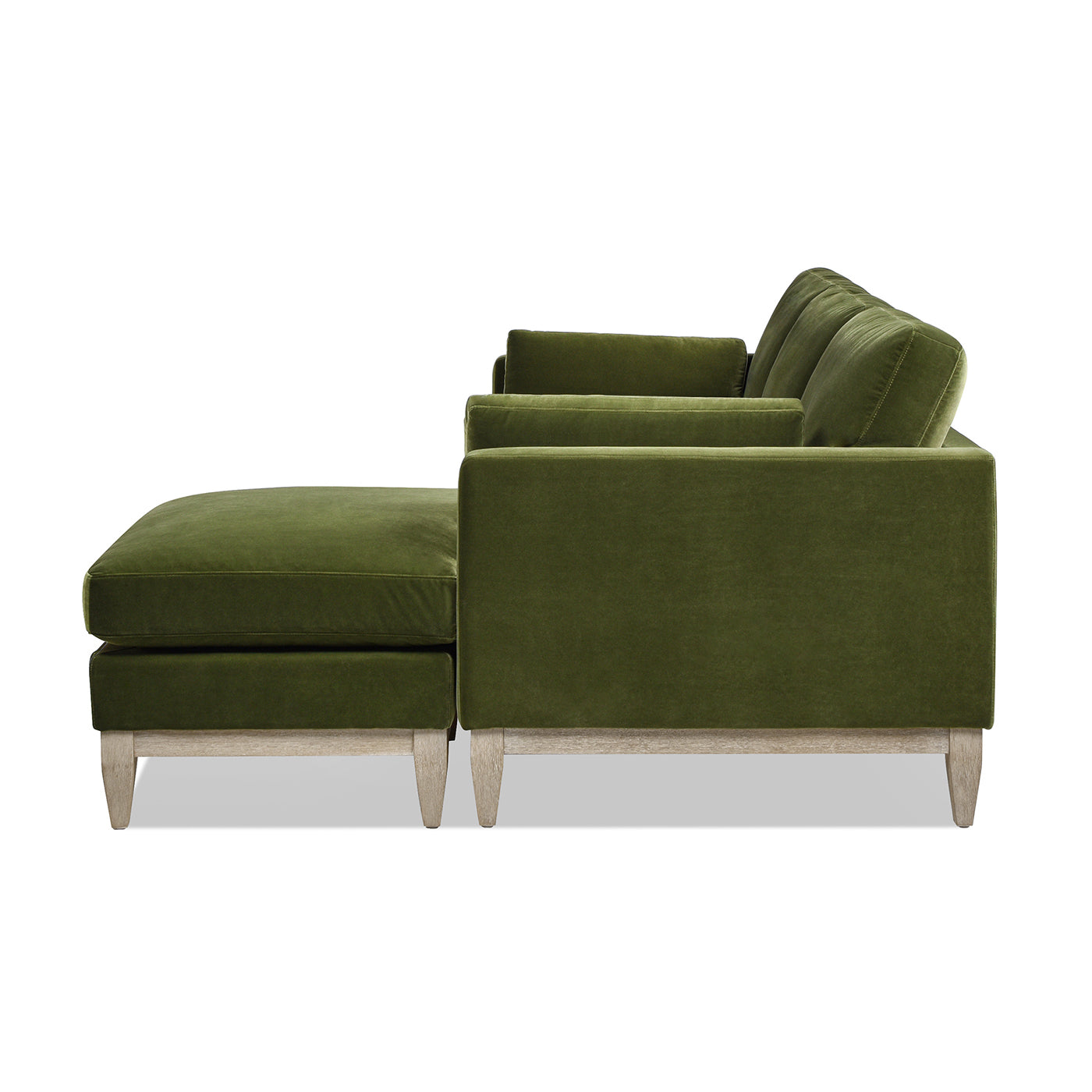 Plush olive green velvet sectional sofa with light wood legs
