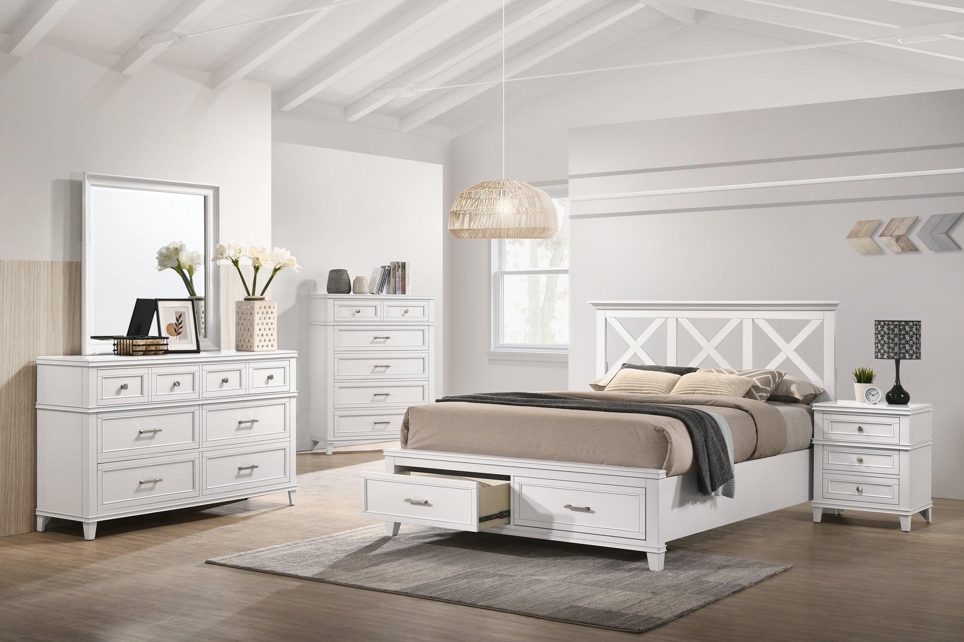 White wooden drawer dresser with mirror and decorative items