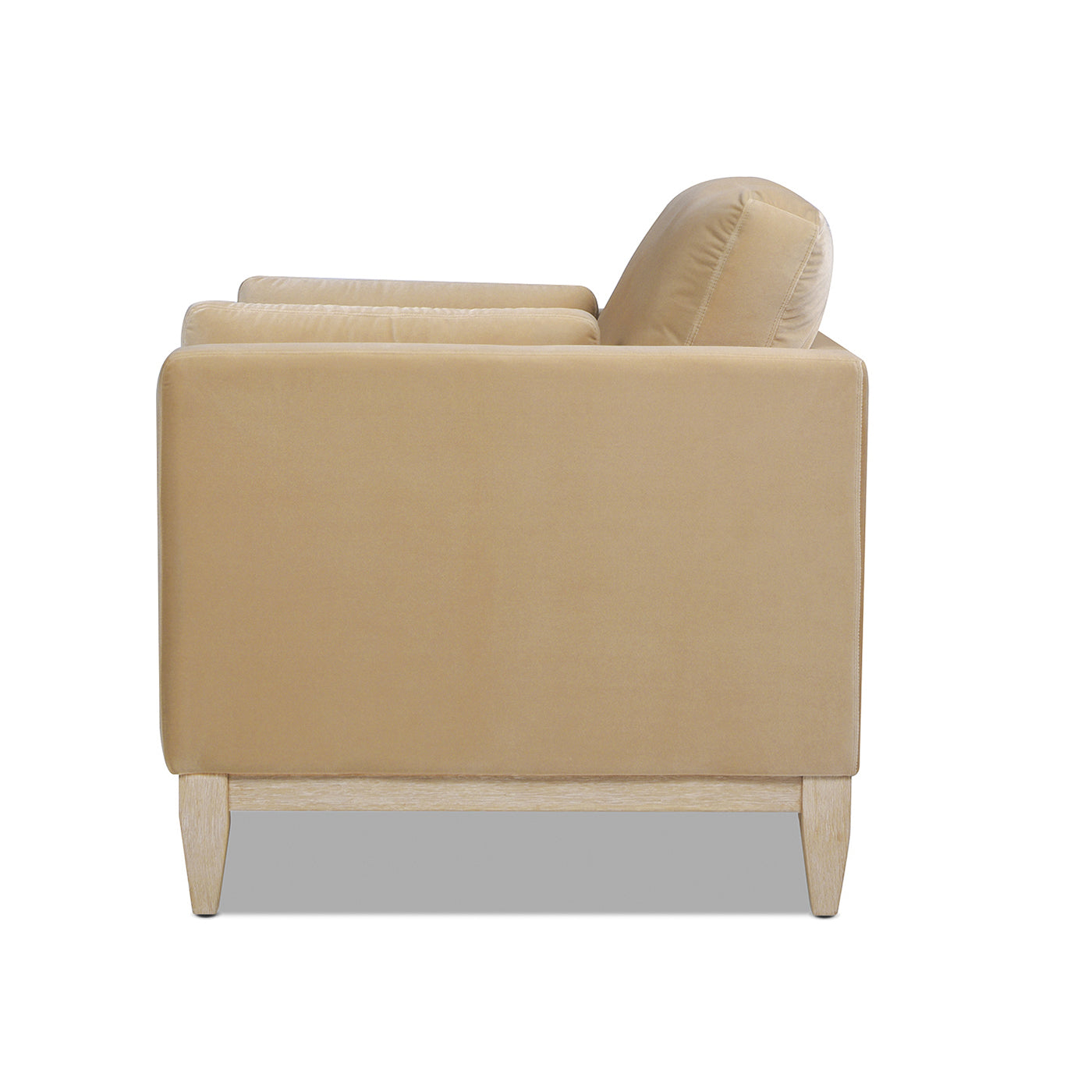 Beige velvet modern sofa with plush cushions and light wood legs