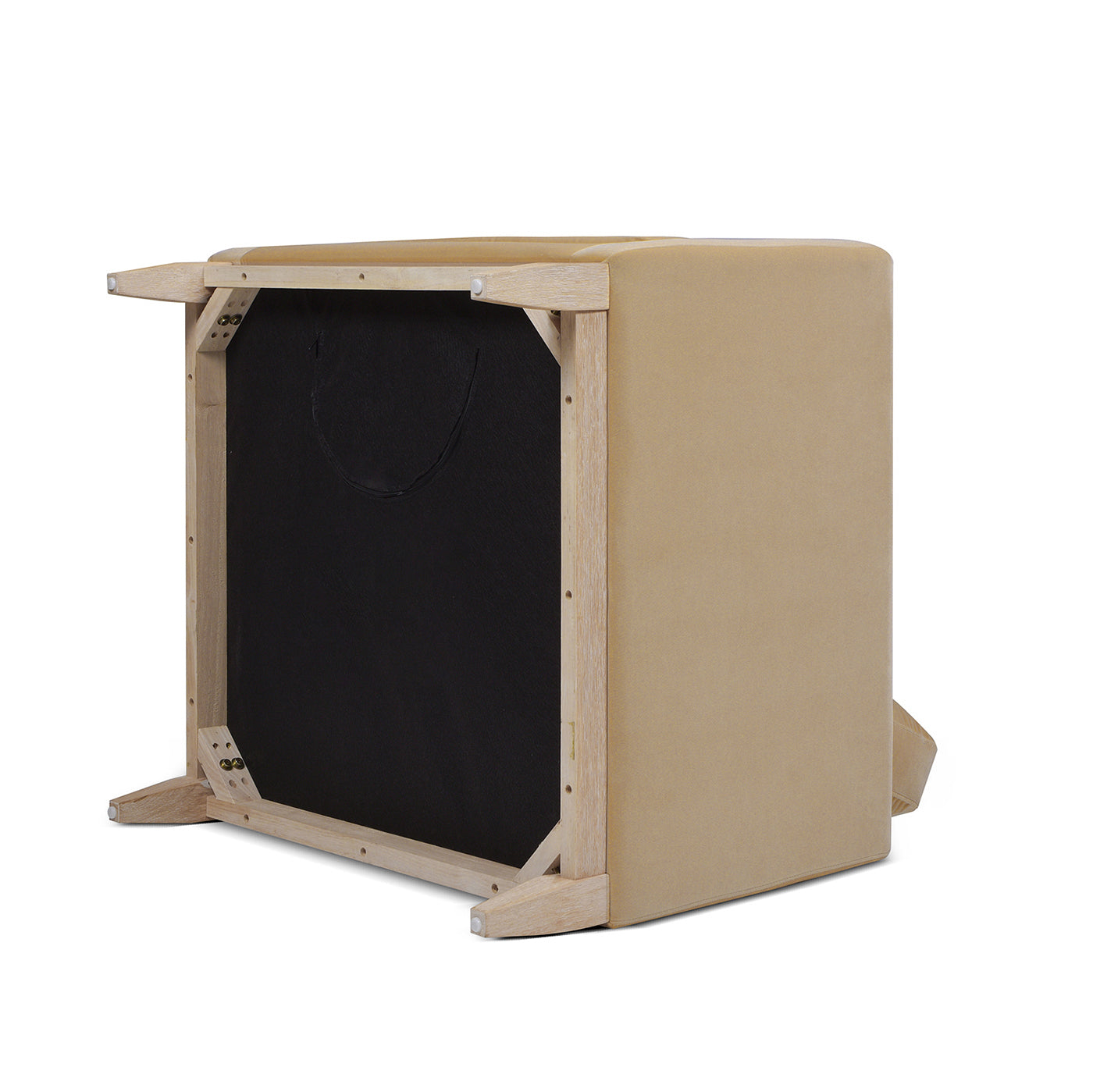 Beige upholstered storage ottoman upside down showing wooden frame and black lining