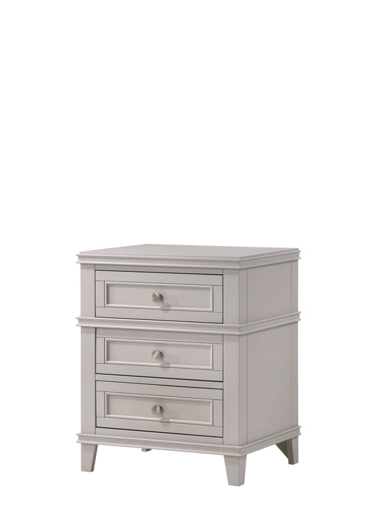 Gray threedrawer nightstand with silver knobs and carved details