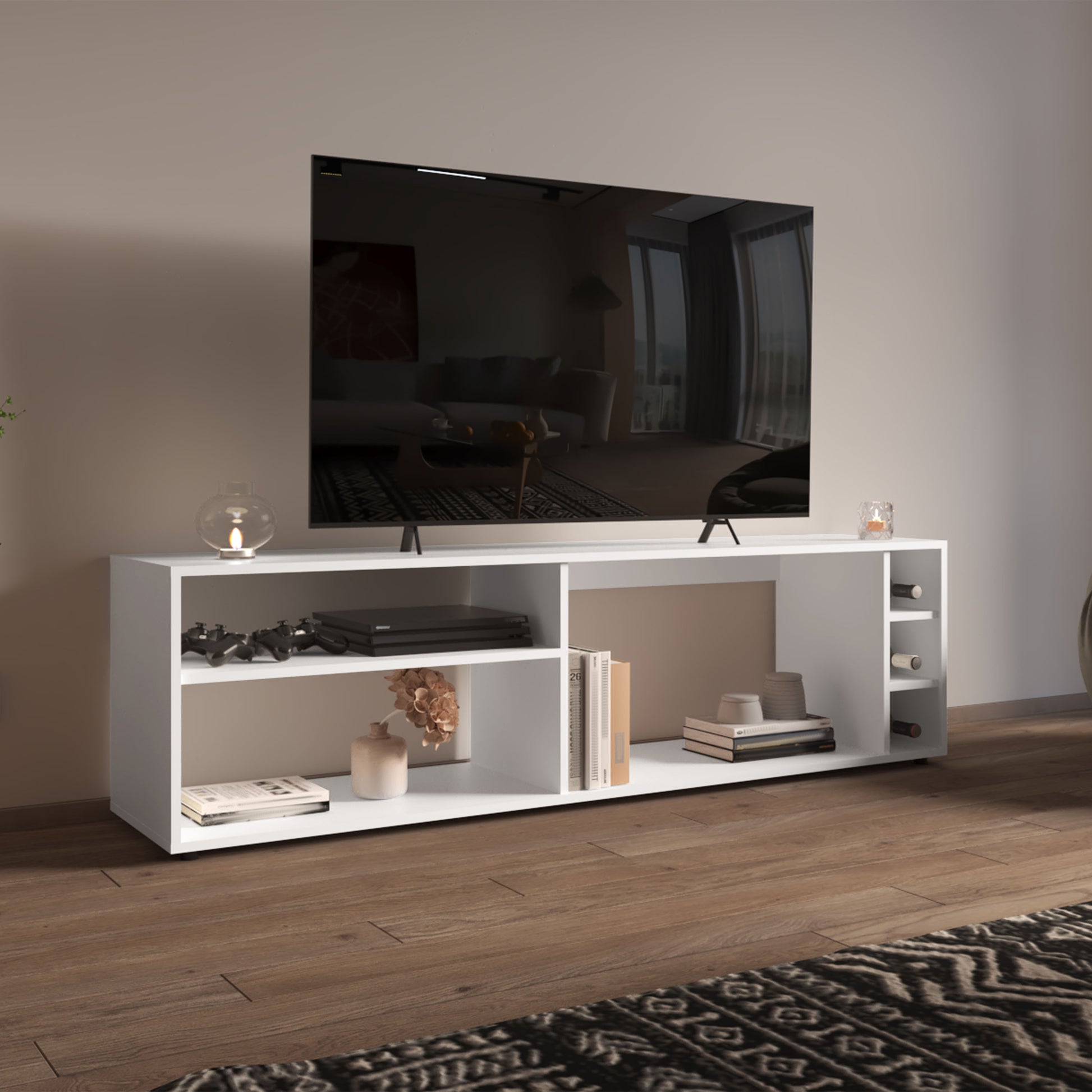 White modern media console with wine rack holding consoles books and decor
