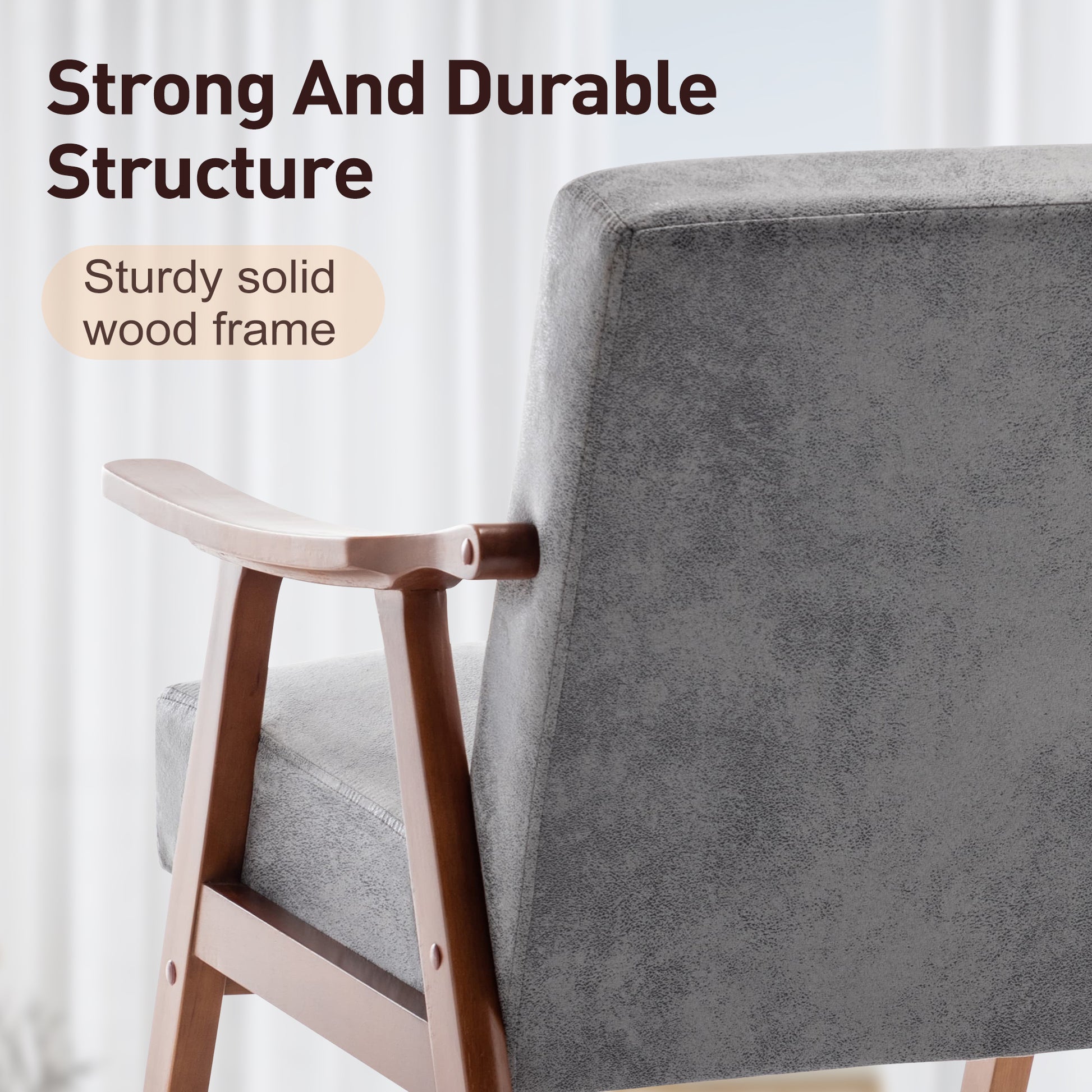 Gray upholstered accent chair with curved wooden armrests and solid wood frame