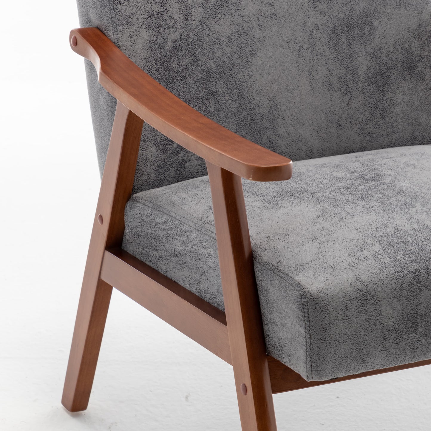 Modern gray upholstered accent chair with solid wood arms and legs