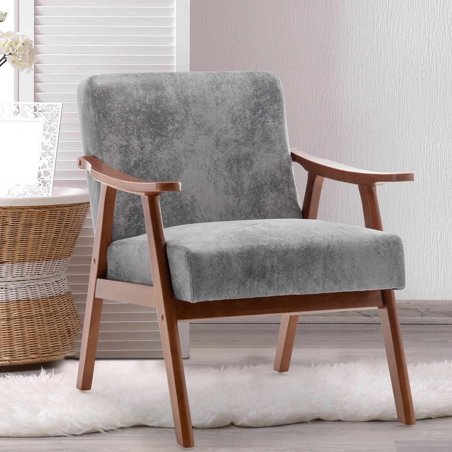 Gray upholstered armchair with natural wood frame