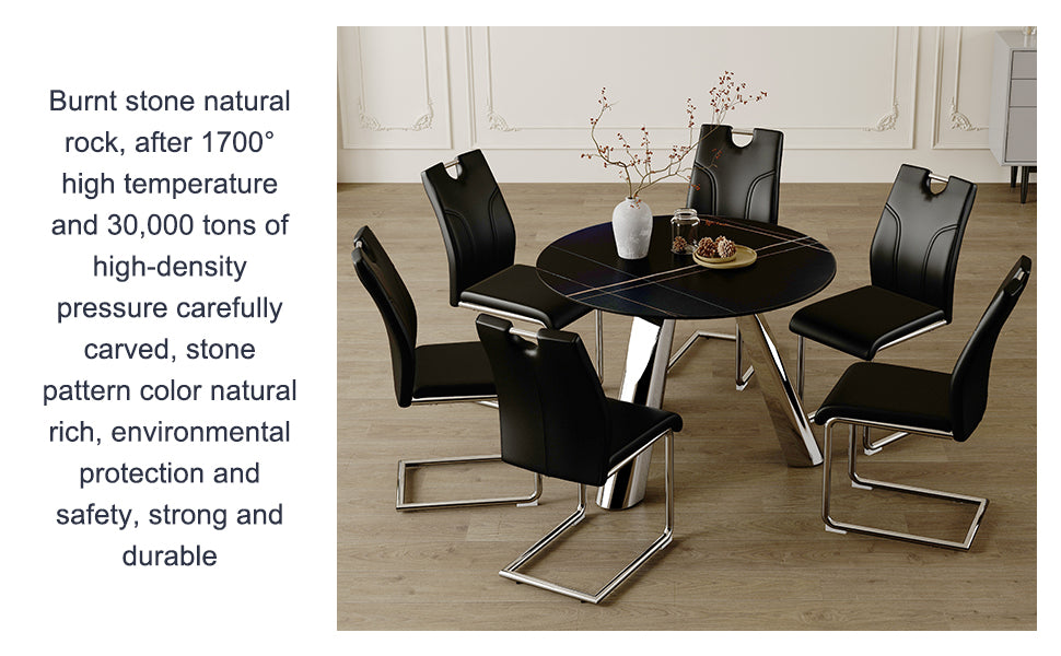 Black leather dining chairs with chrome cantilever legs surrounding a round black stone dining table