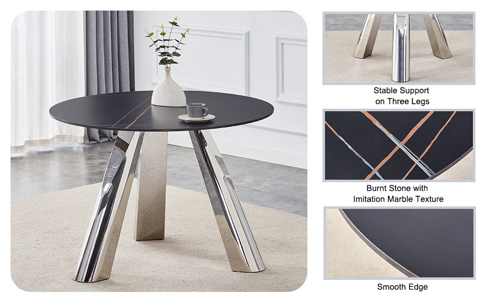 Round black dining table with imitation marble top and chrome legs