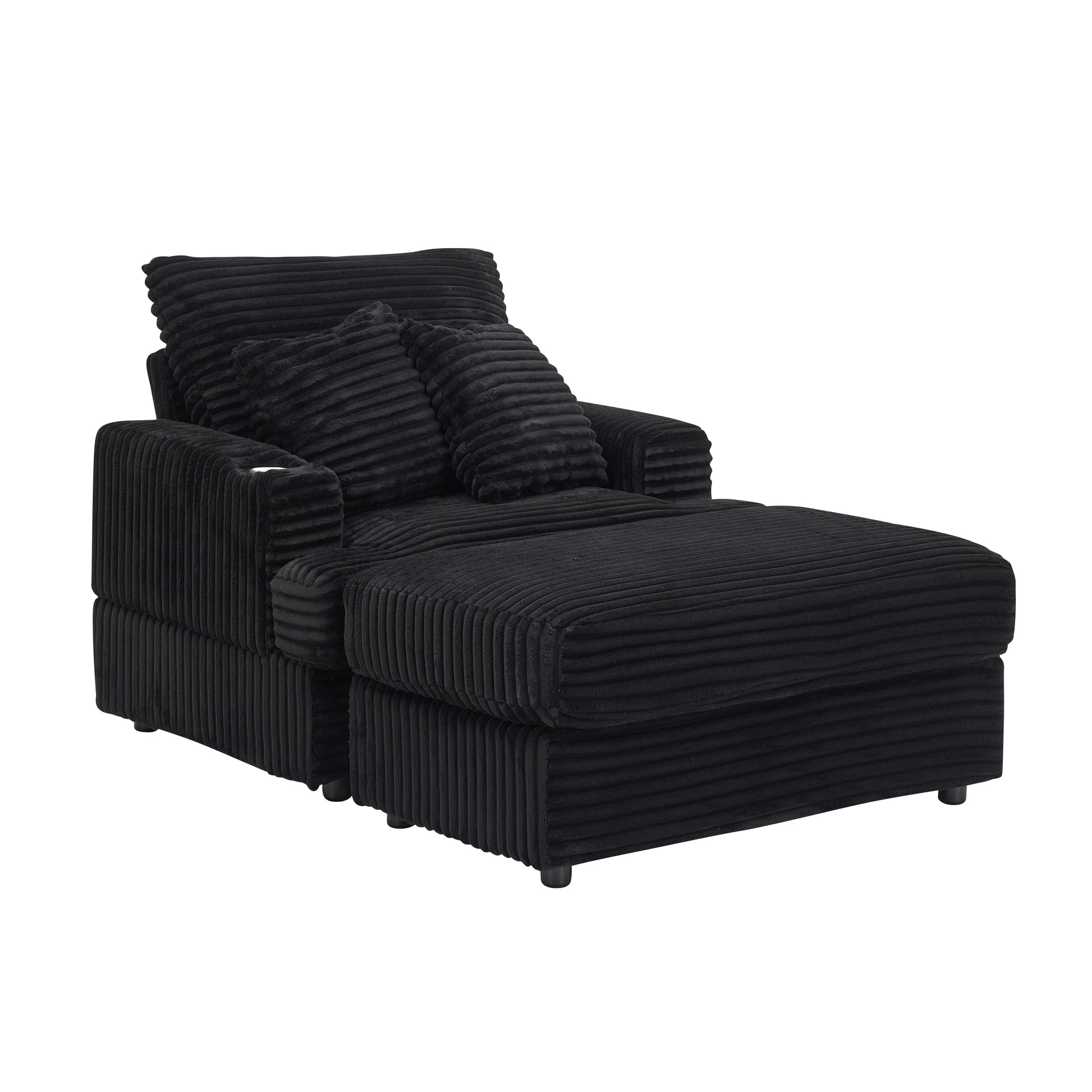 Black corduroy chaise lounge with plush pillows and cup holder