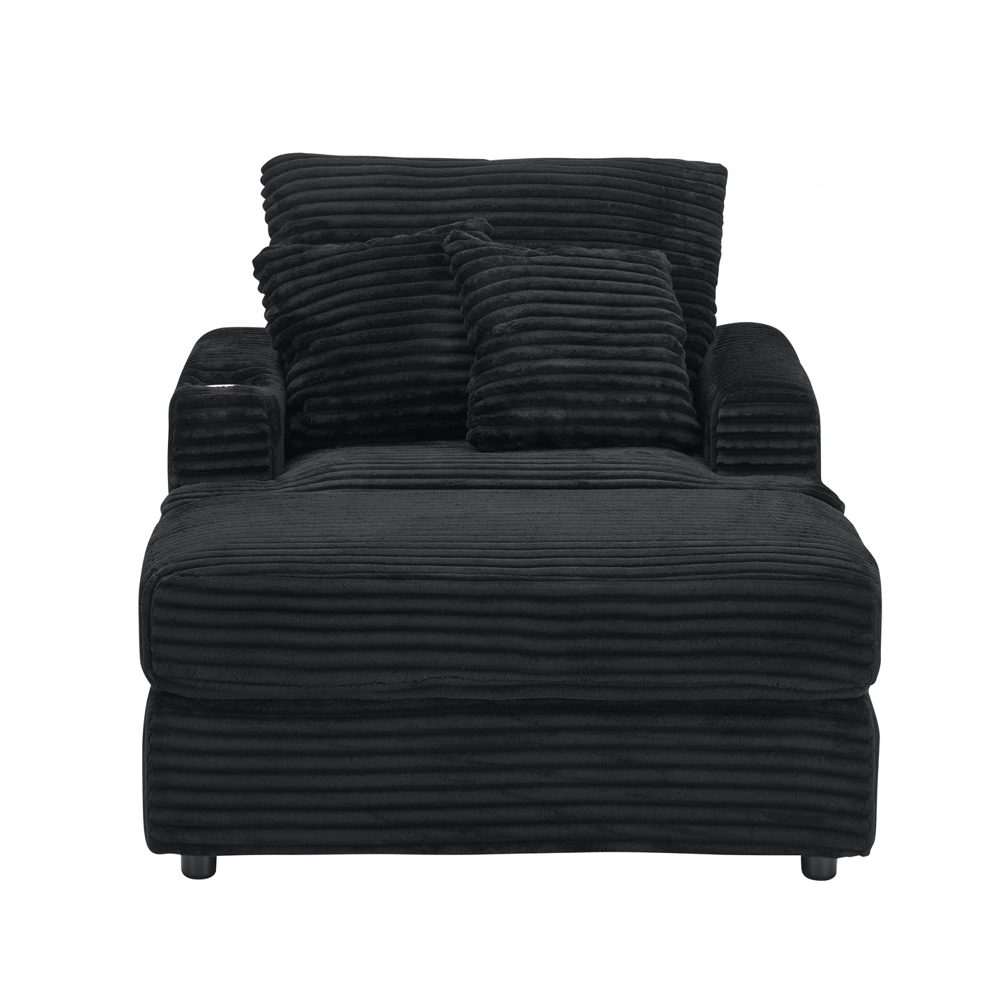 Black corduroy chaise lounge with plush pillows