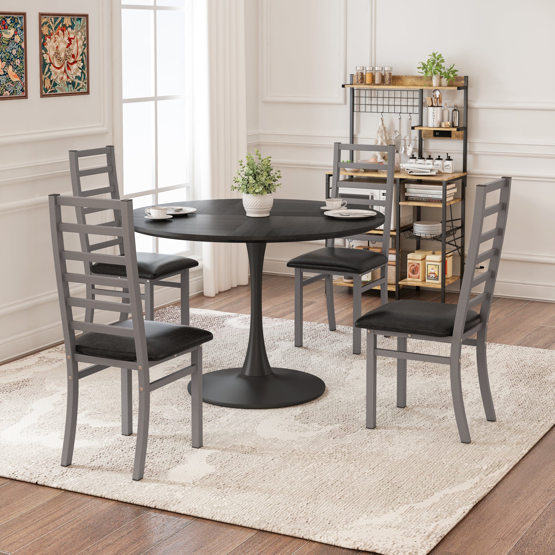 Dark grey tulip base dining table with black faux leather chairs
