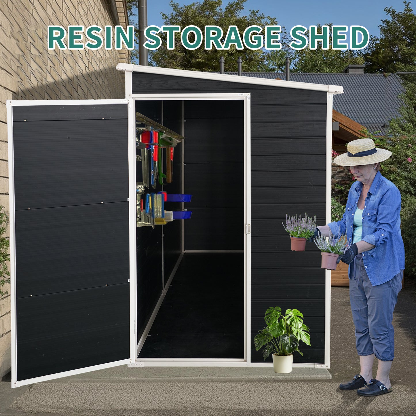 Black resin storage shed with organized tools inside