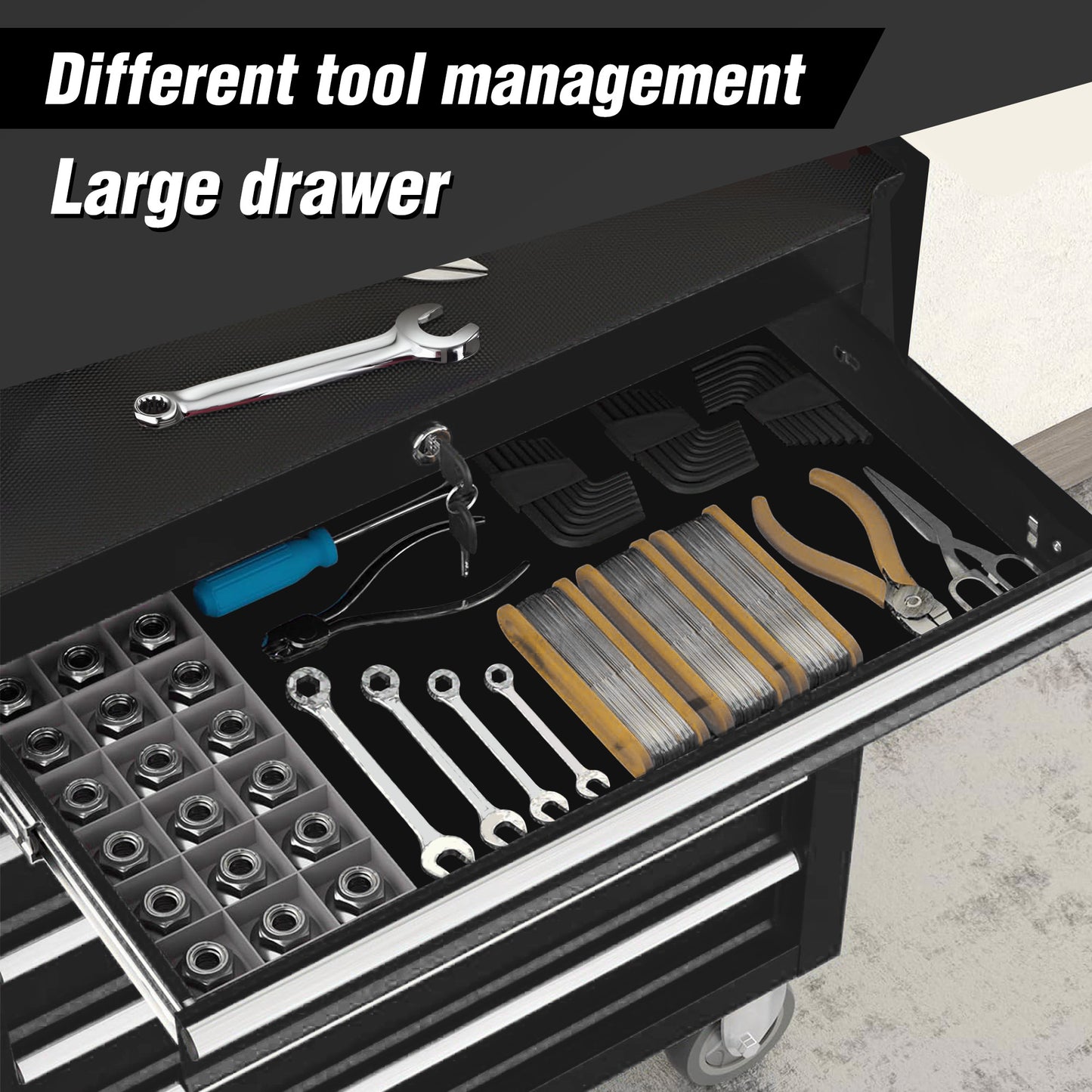 Assorted metric hex keys organized in a black organizer tray within a tool chest drawer