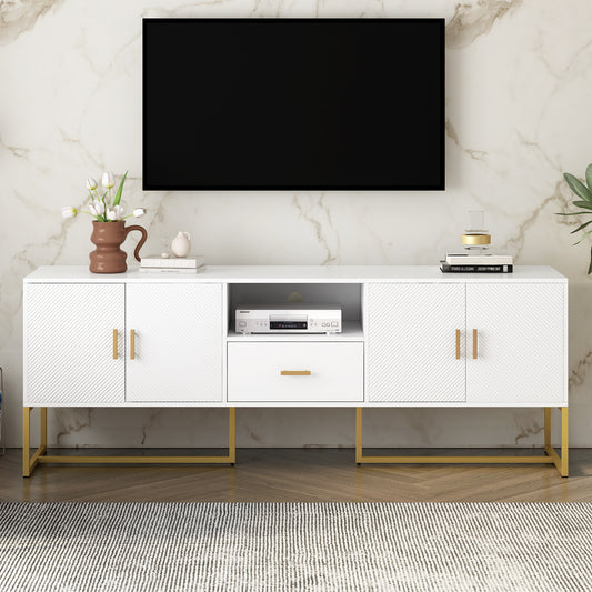 White modern media console with fluted doors and gold legs