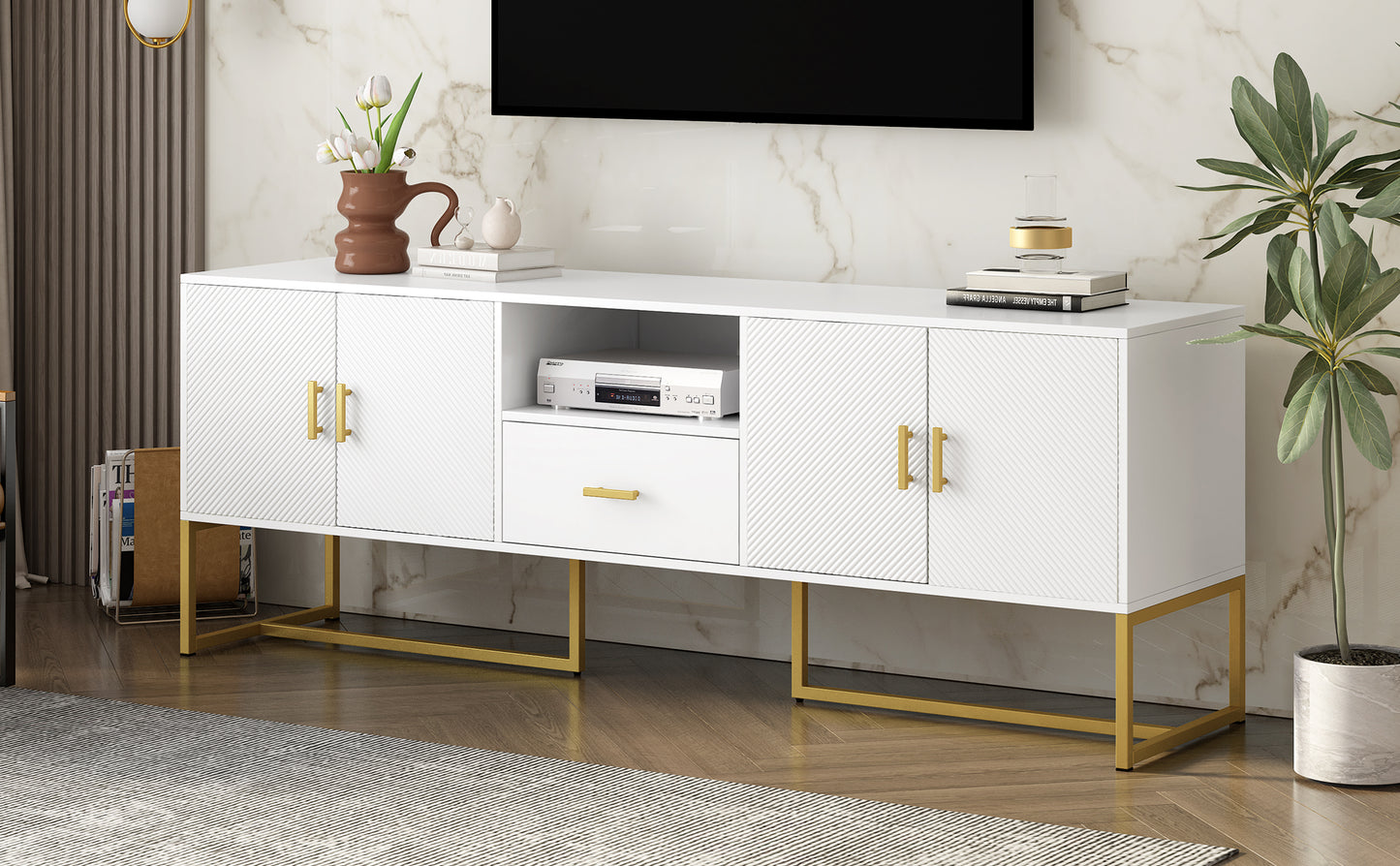 White entertainment center with gold legs and chevronpatterned doors