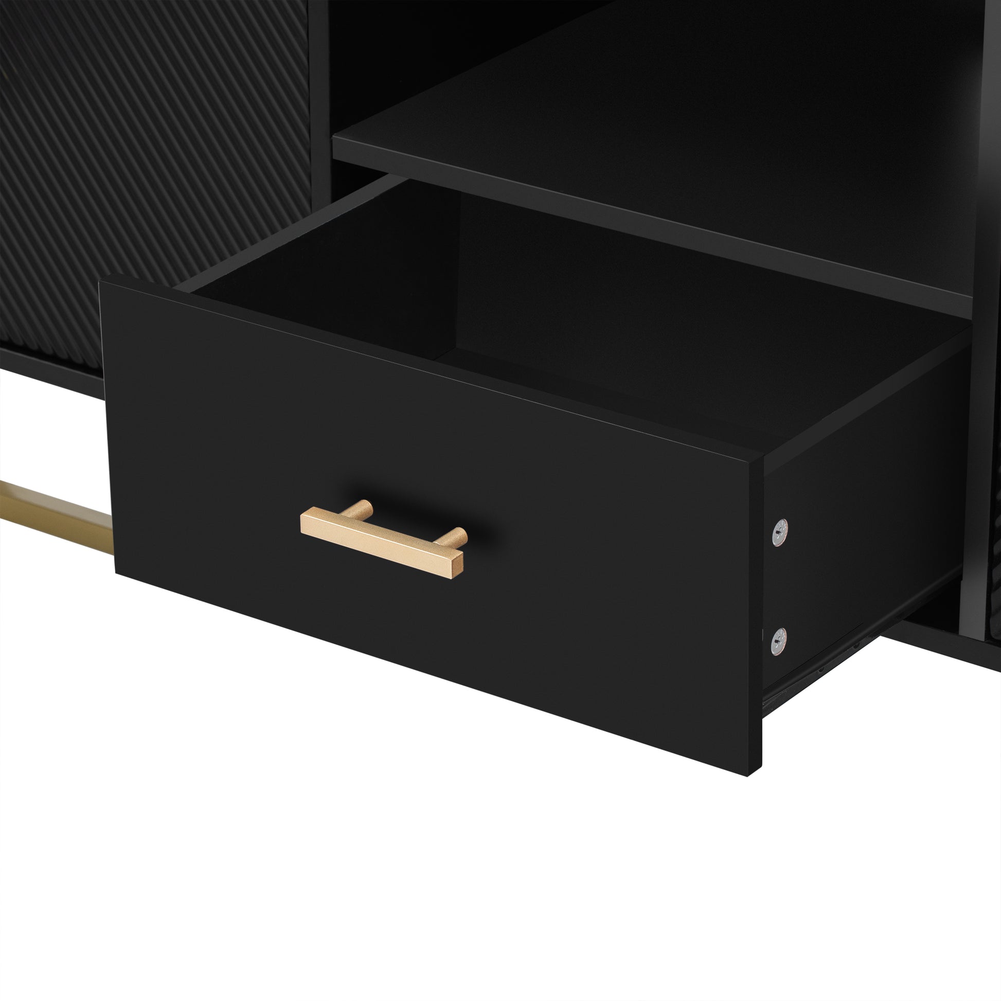 Black media console with gold pull handle and textured door