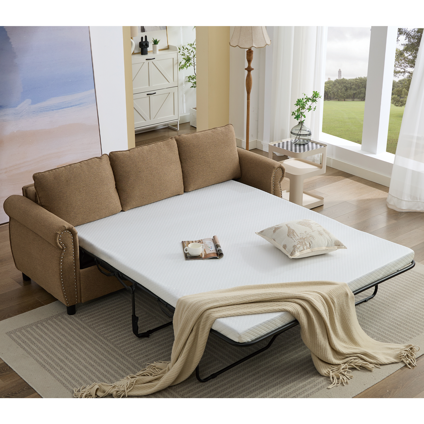 Brown upholstered sofa bed with pullout mattress and decorative pillows