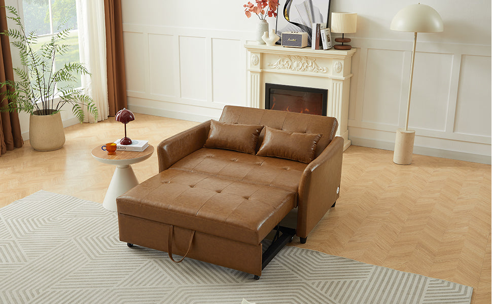 Brown leather sofa bed with pullout mattress and matching pillows