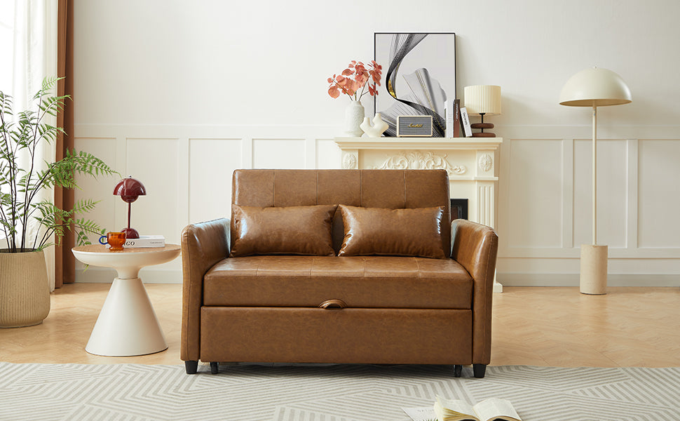 Brown leather sleeper sofa with two throw pillows and pullout bed