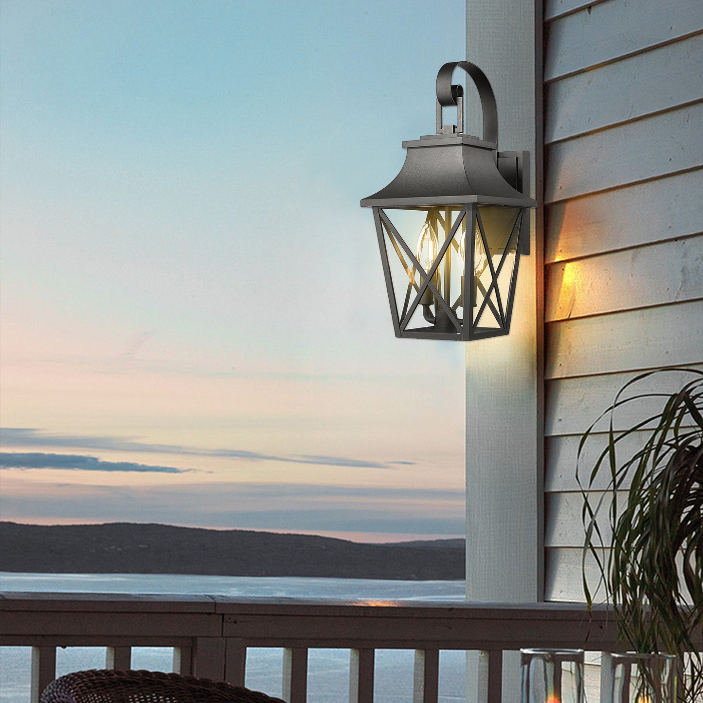 Black metal outdoor lantern with geometric design