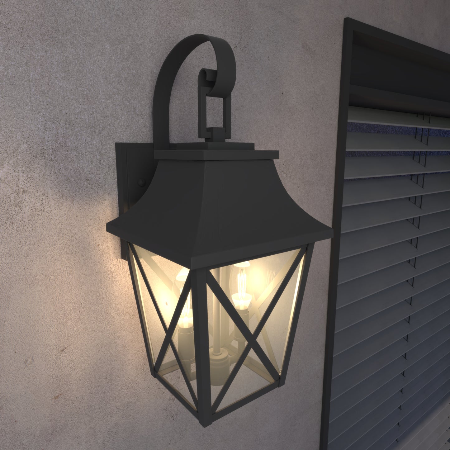 Black metal traditional lantern outdoor wall light with three illuminated bulbs